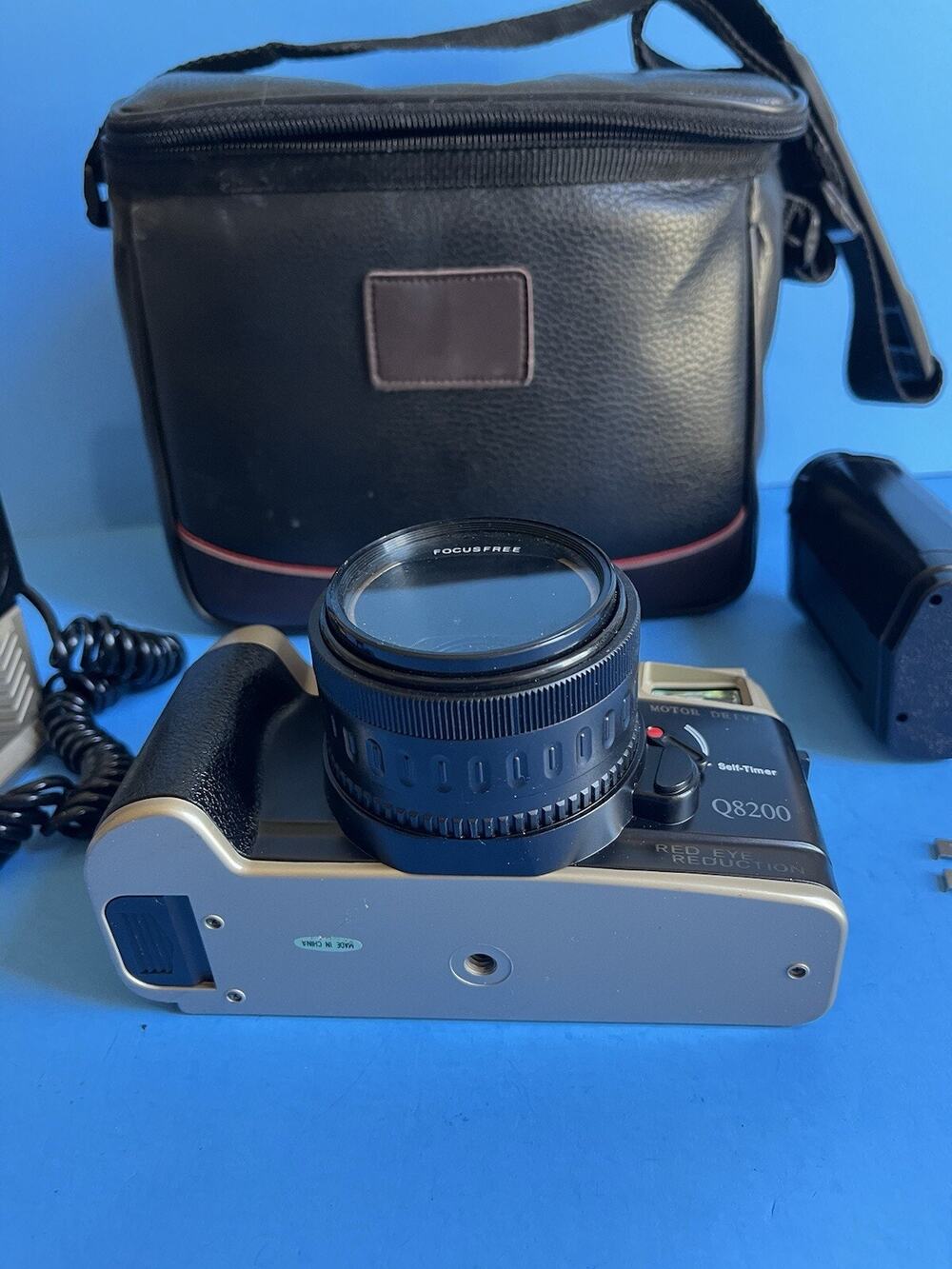 Vintage Canon Q8200 f= 50 mm 1:6.3 Film, accessories and Bag.